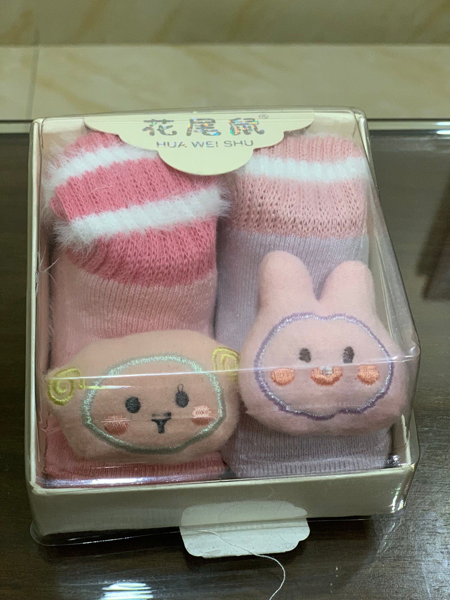 Two pairs of character woolen socks 6 to 12 months