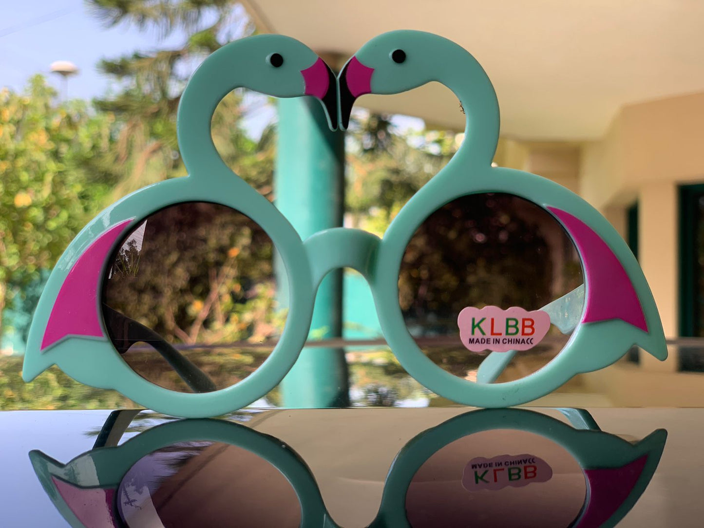 Kids funky swan sunglasses