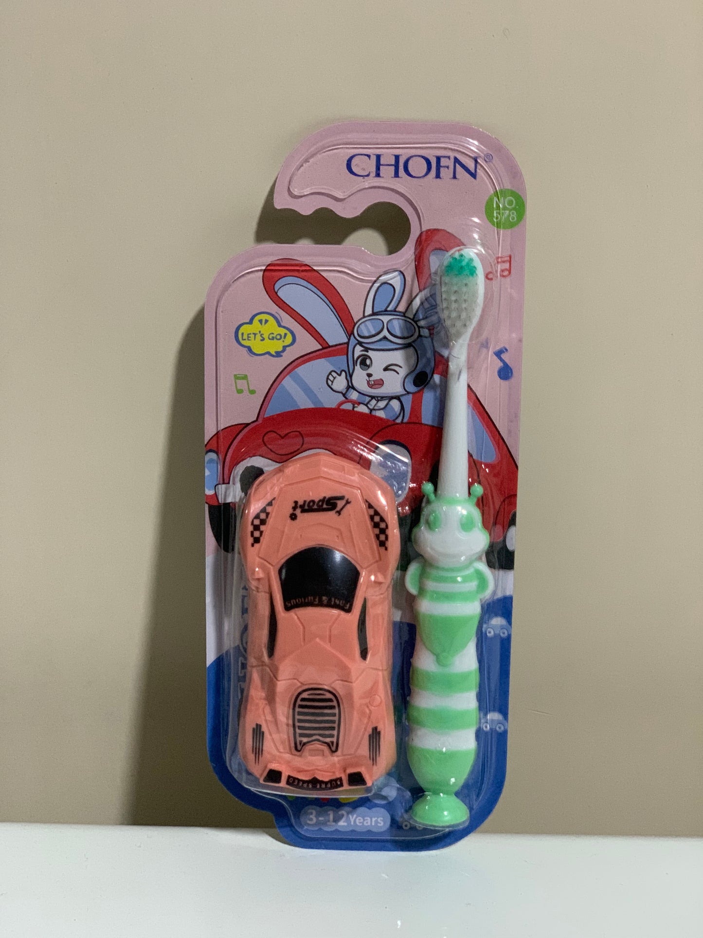 Soft Toothbrush with toy - 3 to 12 years