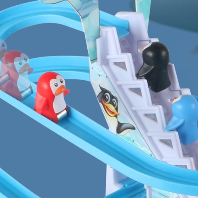 Penguin climbing stairs toy